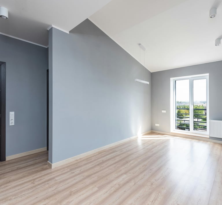 a room with a door and a door way to the outside