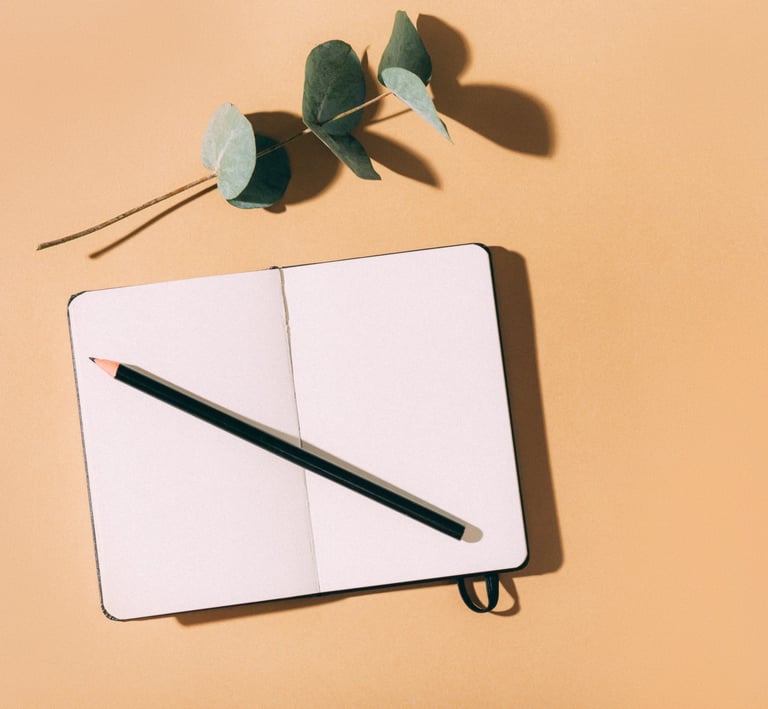 a pencil and pencil on a notebook with a pencil and a pencil