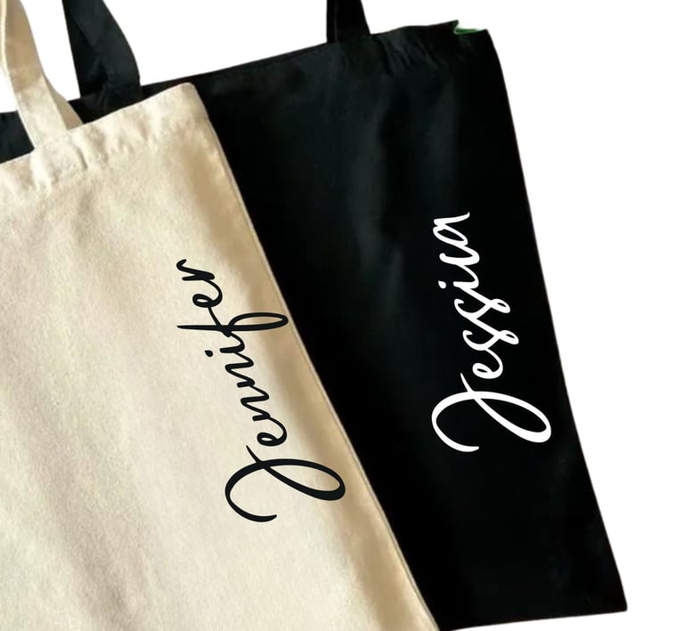 a couple of personalized tote bags