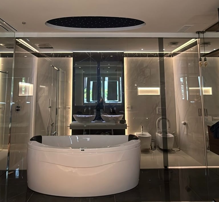 a bathroom with a large tub and a large tub