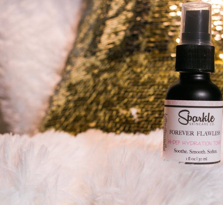 a bottle of Sparkle Skincare serum