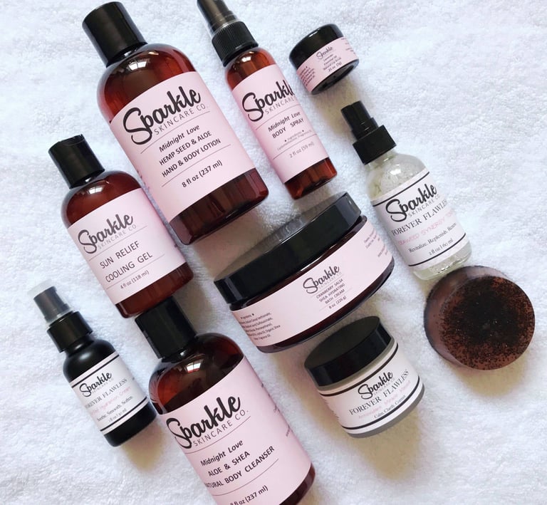 a variety of beauty products including a bottle of sparkle