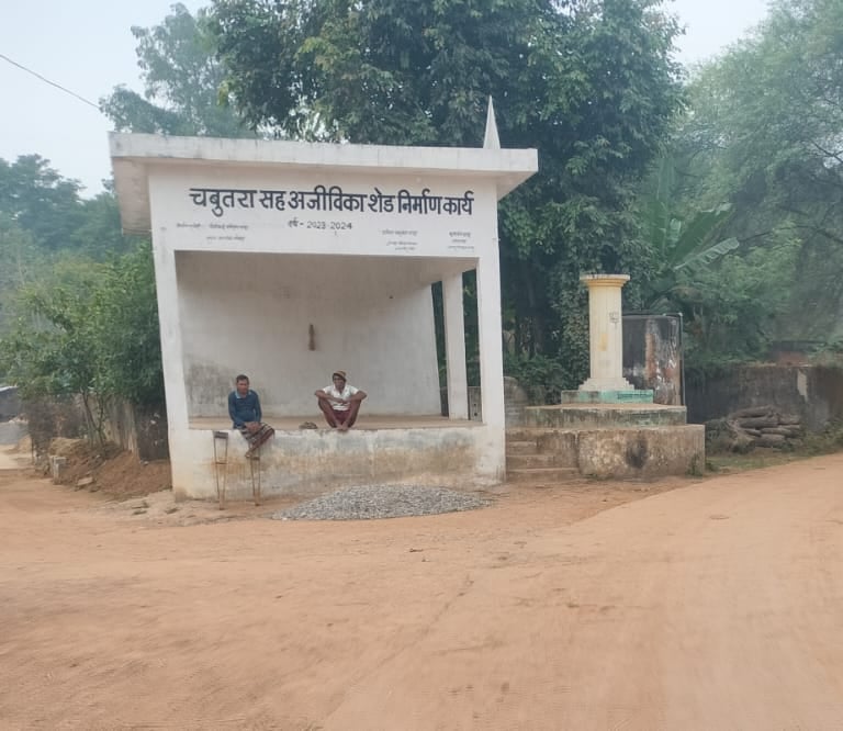 two person sit on chabutra