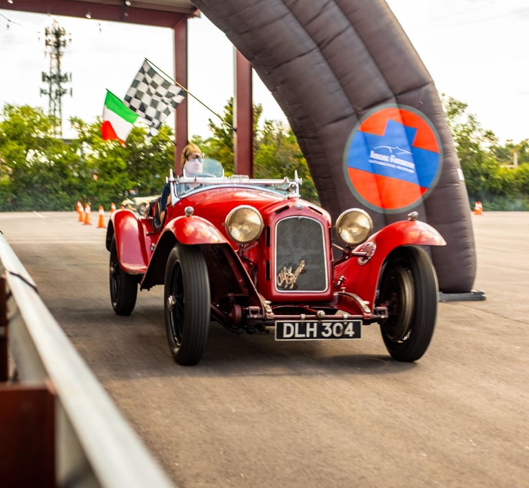 A classic Alfa Romeo driving.