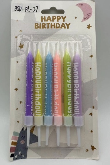 Set of colorful pastel happy birthday candles in a decorative card packaging.