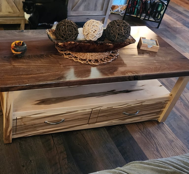 walnut and ambrosia maple coffee table with sliding dovetails. full extension, soft close drawers.