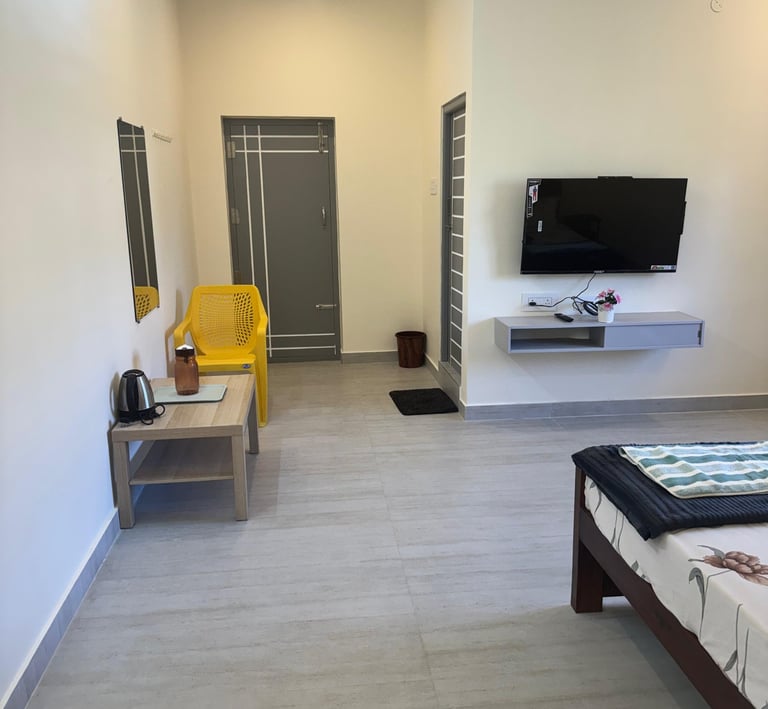 Family Bedroom with dining area, smart tv and King size bed