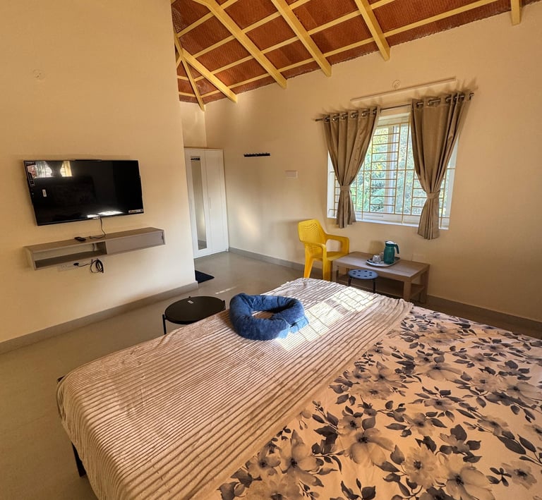 Family Bedroom with wide window, cupboard and Smart TV