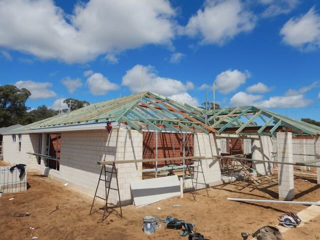 Qualified Perth building inspector evaluating new construction site for structural compliance and workmanship quality.