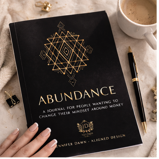 mockup of a black Abundance journal workbook 