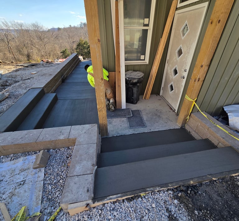 a house with a door and steps leading to a porch