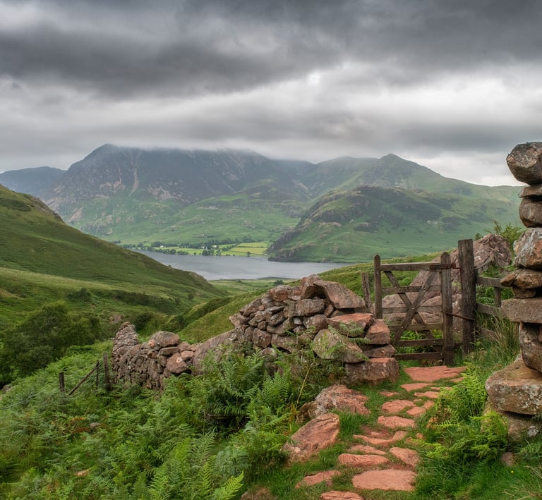 A view of a stone wall and gate looking towards Crummock Water in the Lake District ©Mick Howard