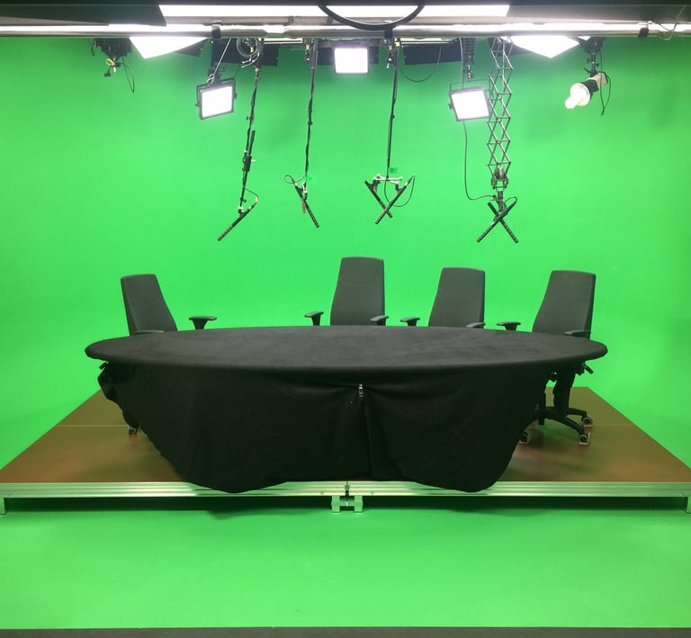 conference table, green screen, panel discussion