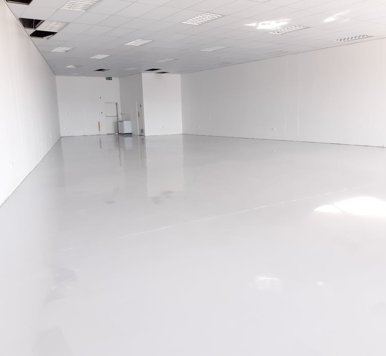 Tswanacrete Botswana installing pharmaceutical-grade epoxy flooring for seamless, hygienic, and durable surfaces