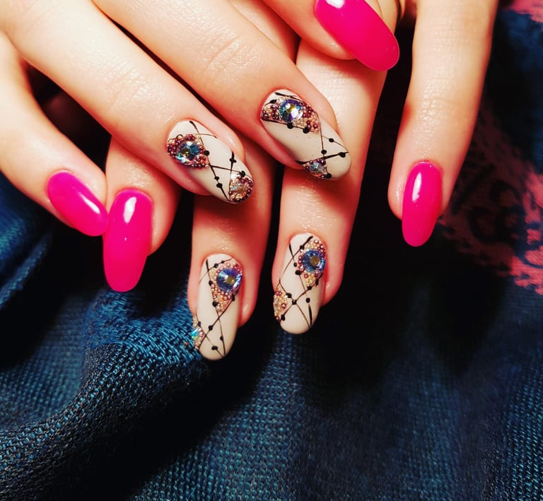 a woman's hand painted nails and manicured manicures
