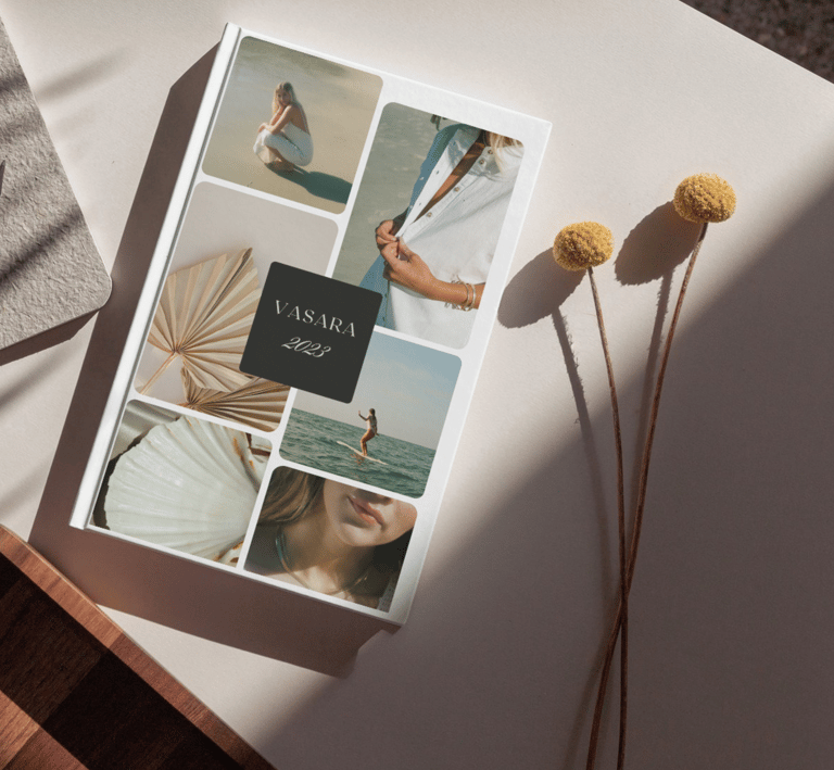 a book with a picture of a woman in a white shirt and a book with