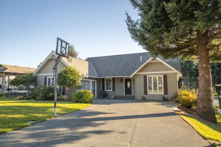 a house with a large driveway 