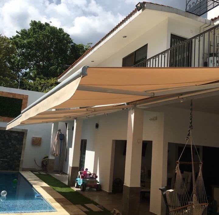 toldo retractil o de proyeccion tela sombrela sistema automatizado