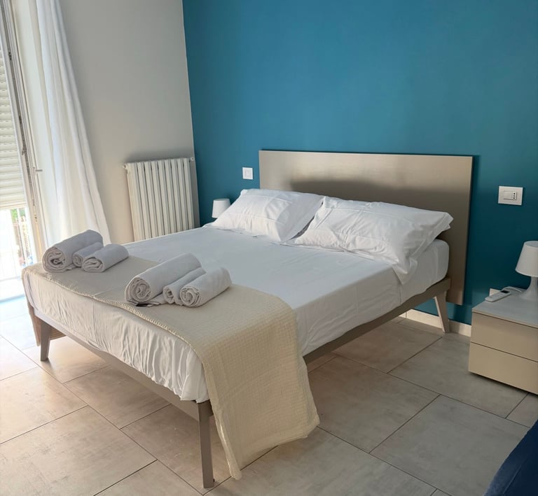 domus casa vacanze stanza da letto