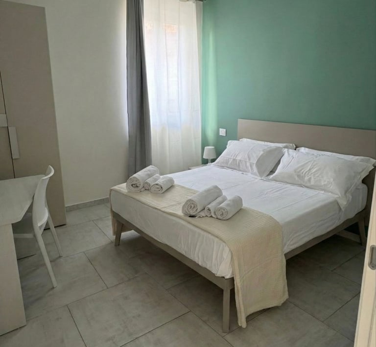 domus casa vacanze stanza da letto