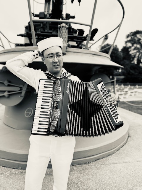 Sailor playing accordion