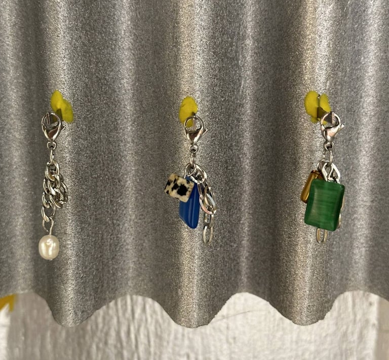 Three fun.arc.ik. necklace charms with pearls, blue stone, Dalmatian jasper, and green stone