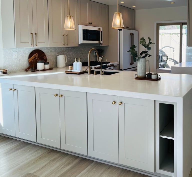 modern kitchen transformation with marble and quartz