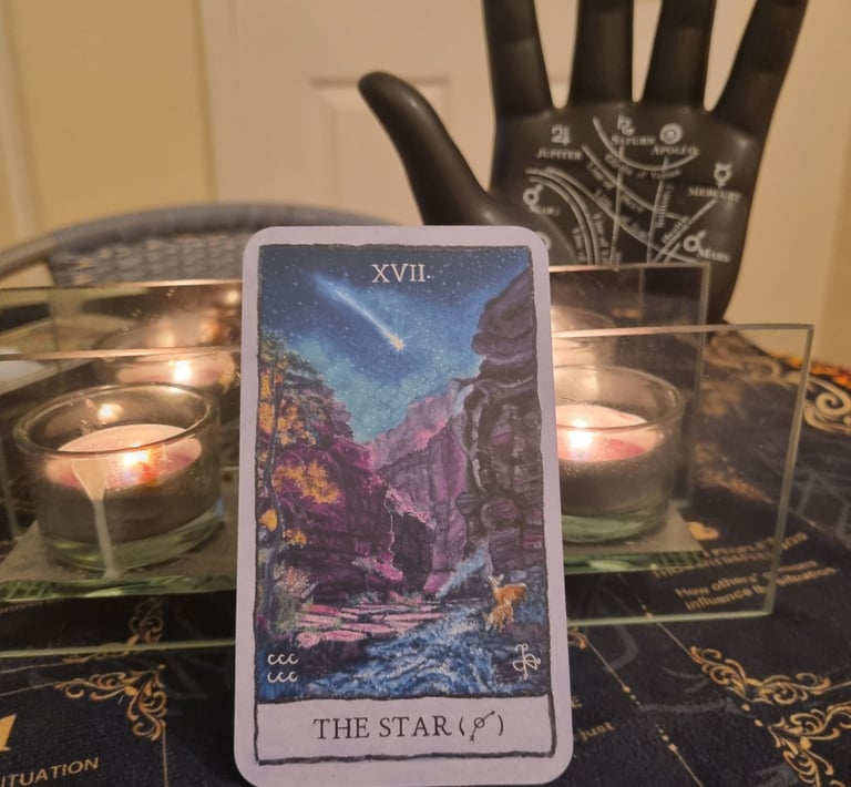 the star tarot card, ornamental hand, candles