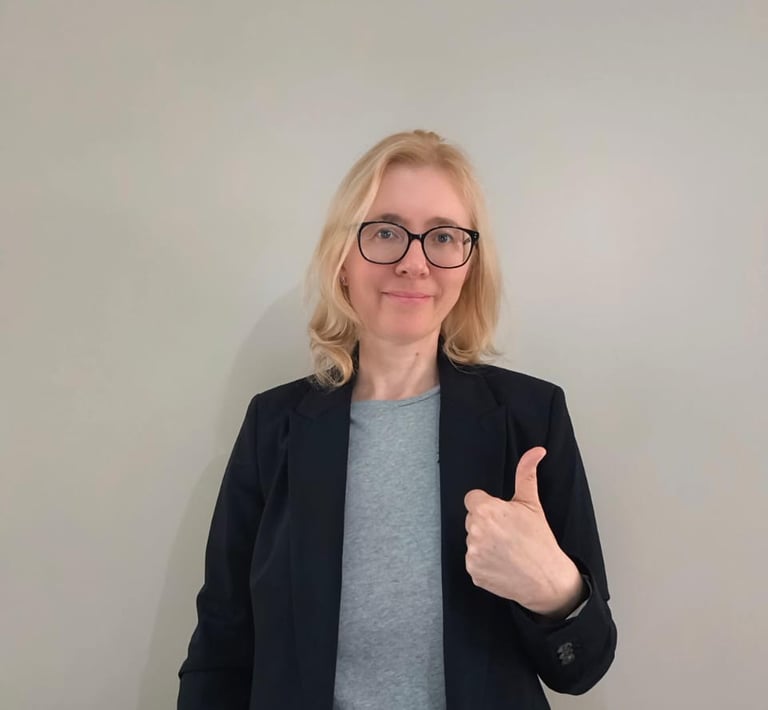 Professional psychologist smiling for a photo in formal wear