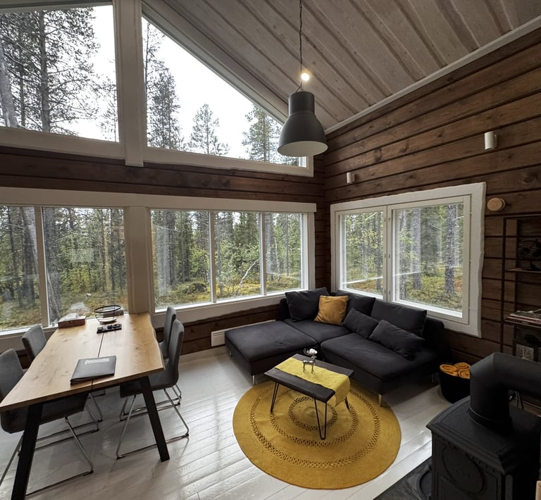 Modern log house, high ceiling, lapland log home, large scenic windows overlooking forest