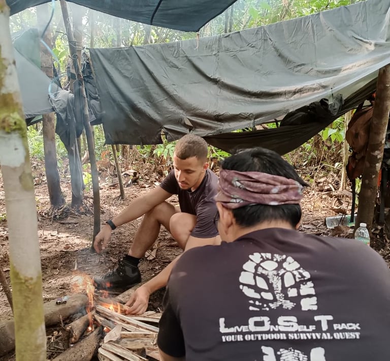  Guide and traveler sitting around a campfire