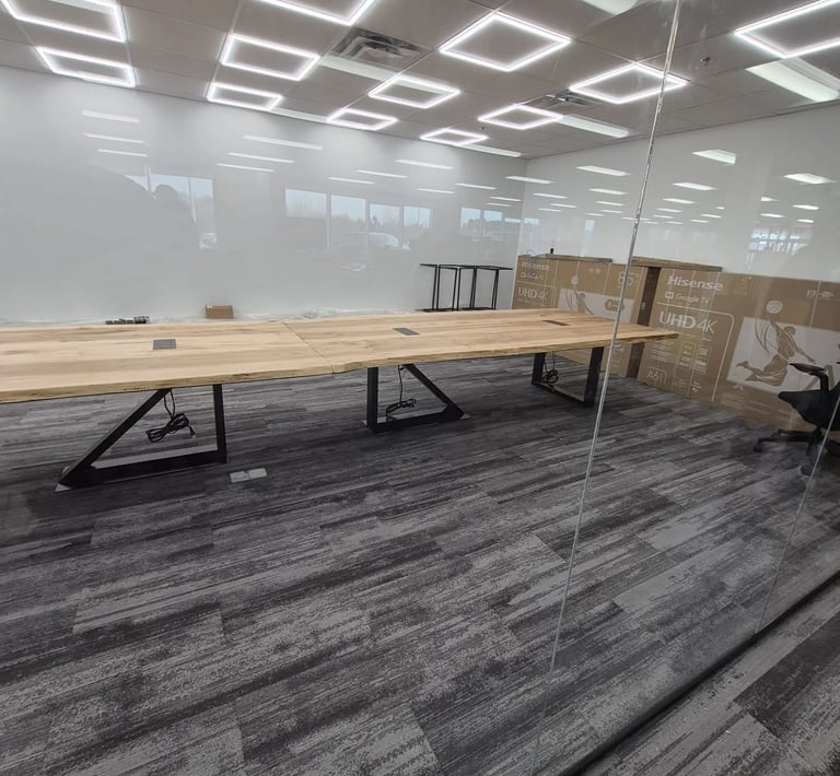 21ft x 4.5ft maple boardroom table — installed boardroom view