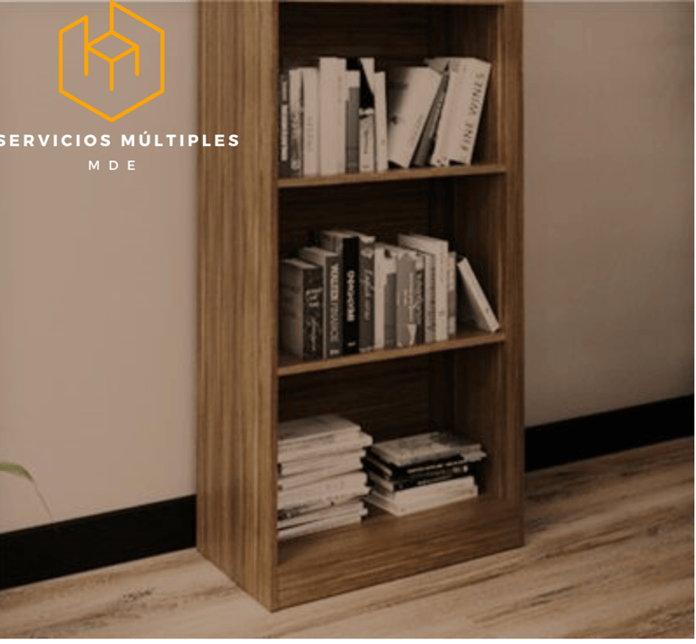 a bookcase with books on it and a plant in the background
