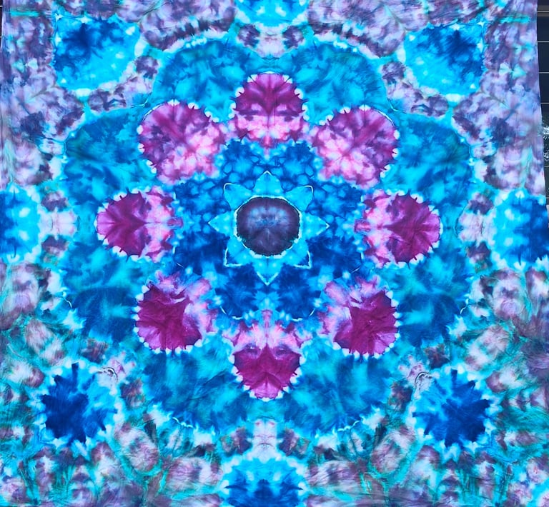 Blue and mauve Kaleidoscope design on cotton