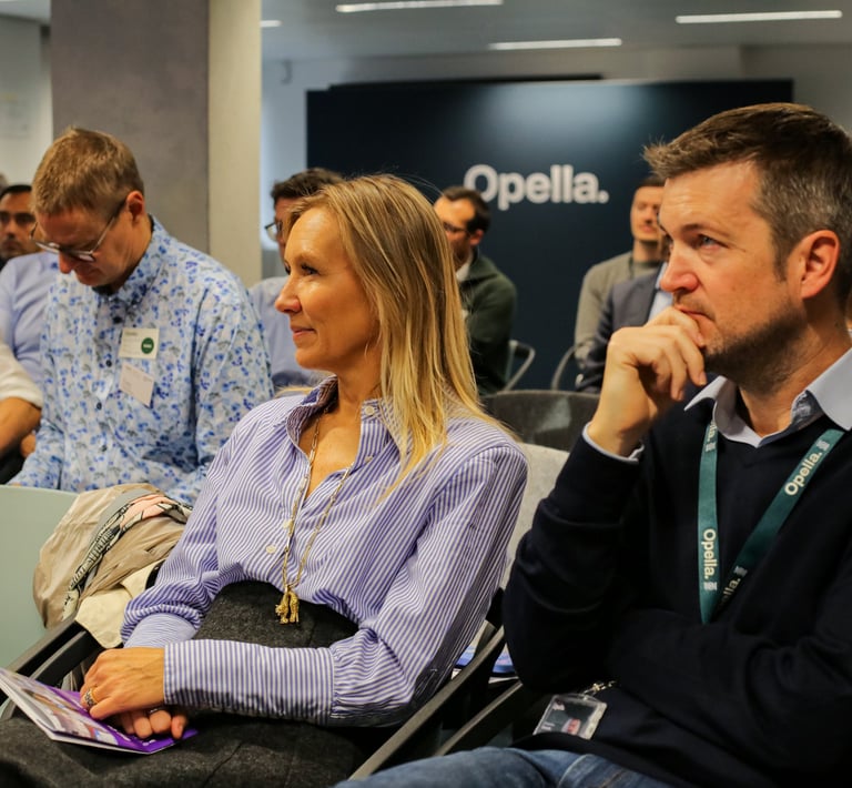 “Professional event photographer capturing audience moments