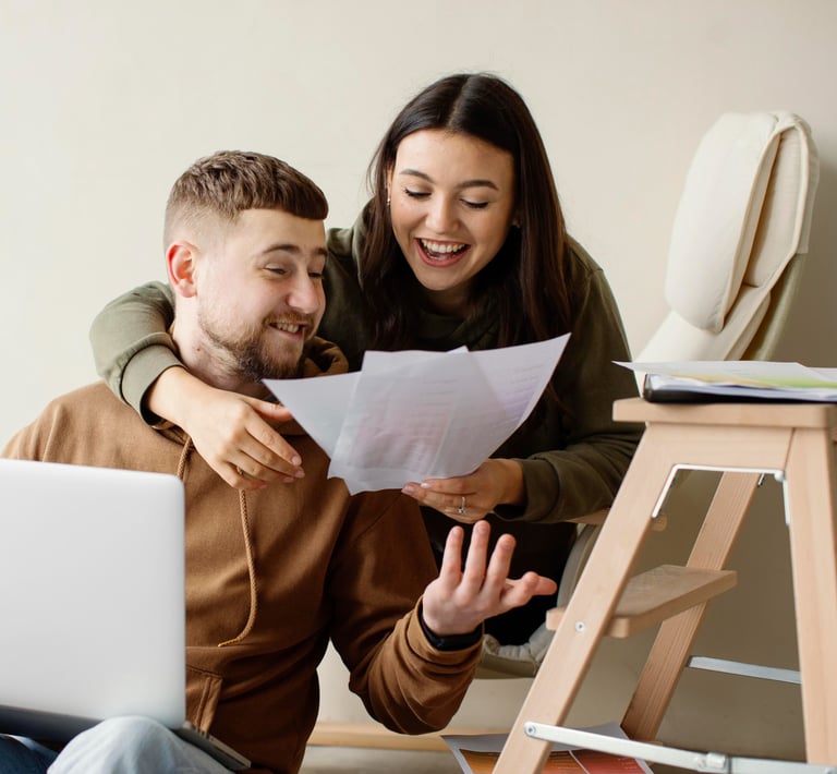 couple looking at loan and life insurance policy