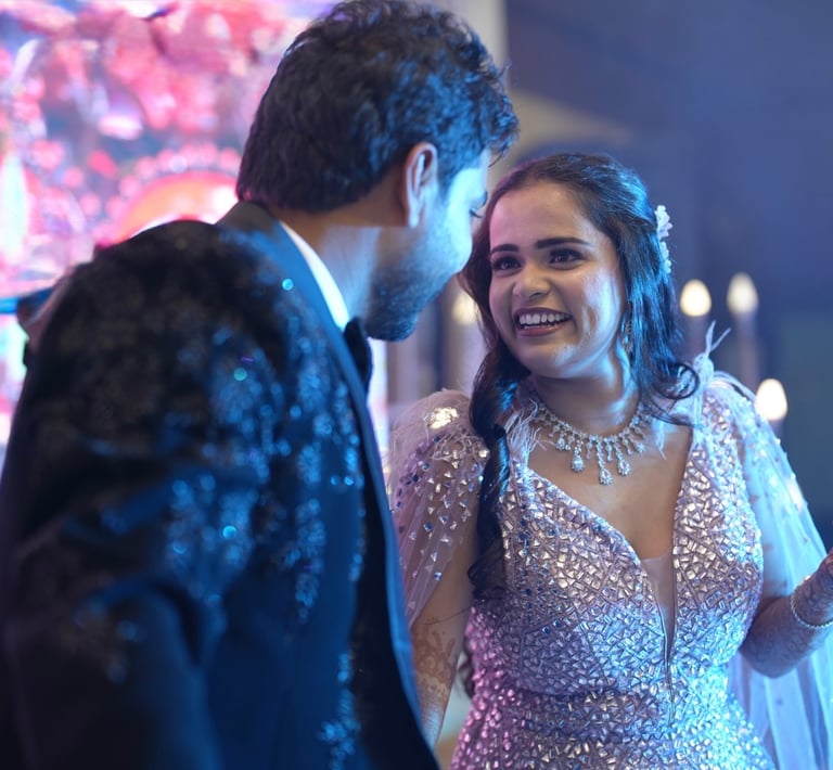 "Engagement stage décor with romantic lights and floral theme"