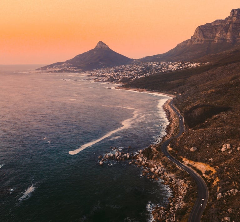Cape Town at sunset with a view of Table Mountain, Lions Head and Camps Bay