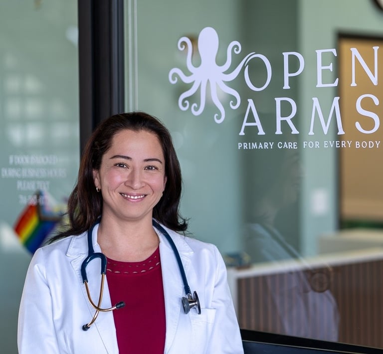 Dr Connolly smiling at the entrance of the clinic