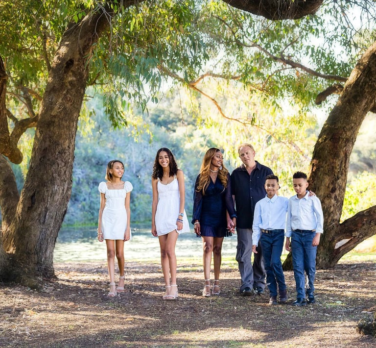 Family portrait with parents and teenage children outdoors, Perth family photographer Fisher Photography