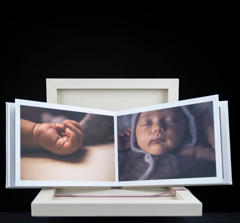 a baby's picture taken in a photo album