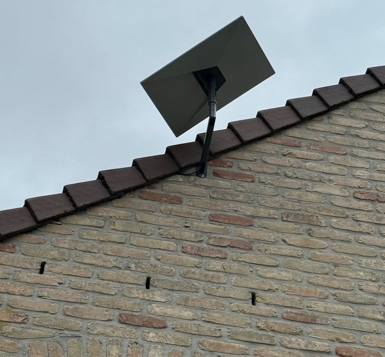 Antenne Starlink montage sur façade