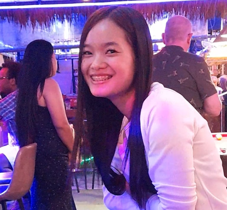 Thai woman smiling in bar at Wonderland 2 in Hua Hin