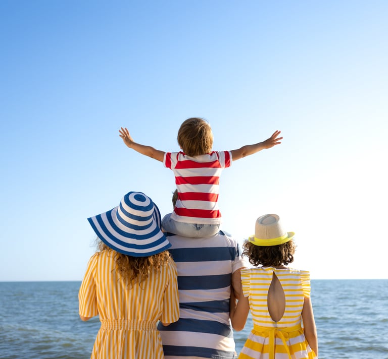 Family vacation facing beach