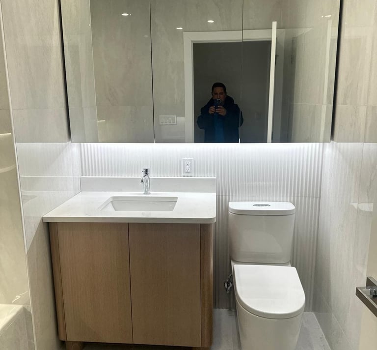 a bathroom with a toilet and a sink