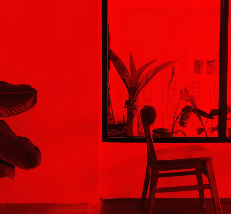 a chair in a room with red light