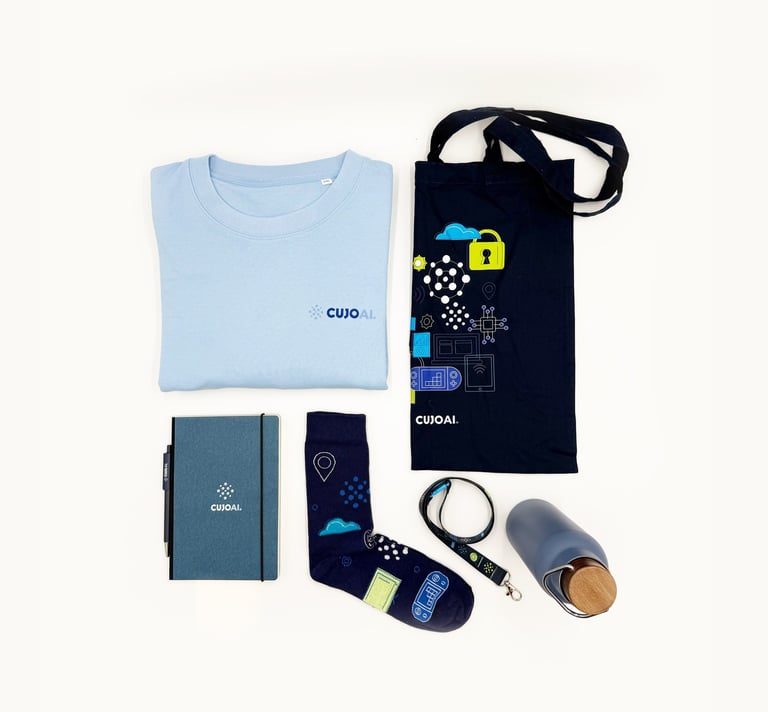 Custom CUJO AI branded company swag including a blue t-shirt, tote bag, notebook, socks, and water bottle.