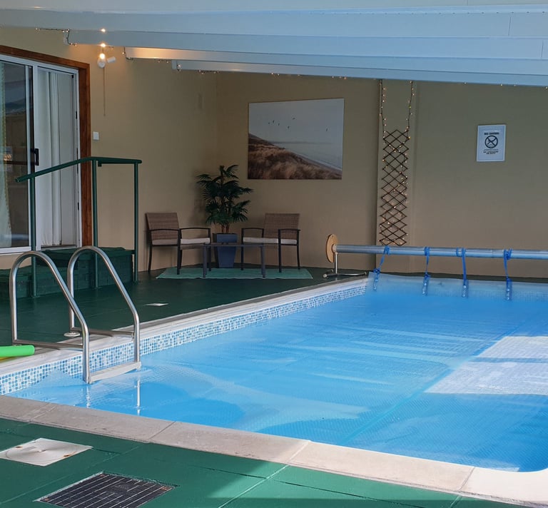 The heated indoor swimming pool at Redroofs
