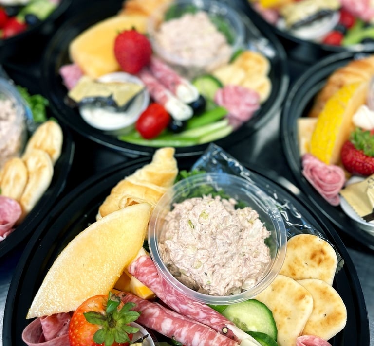 charcuterie lunch chicken salad veggies macaron