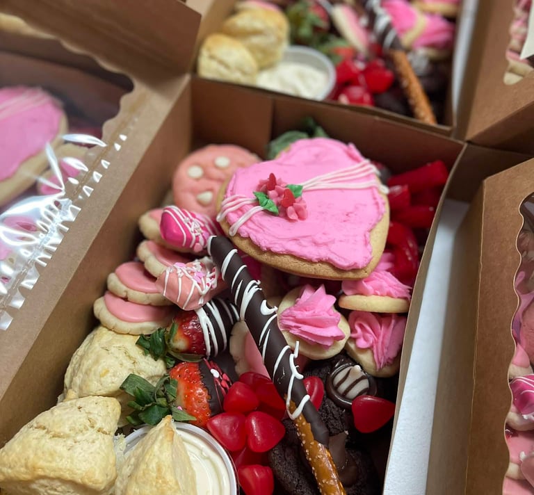 valentines boxes cookies chocolate pretzels and strawberries